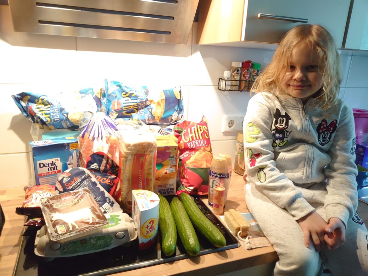 Ein Lebensmittel-Gutschein für die Familie von Emily